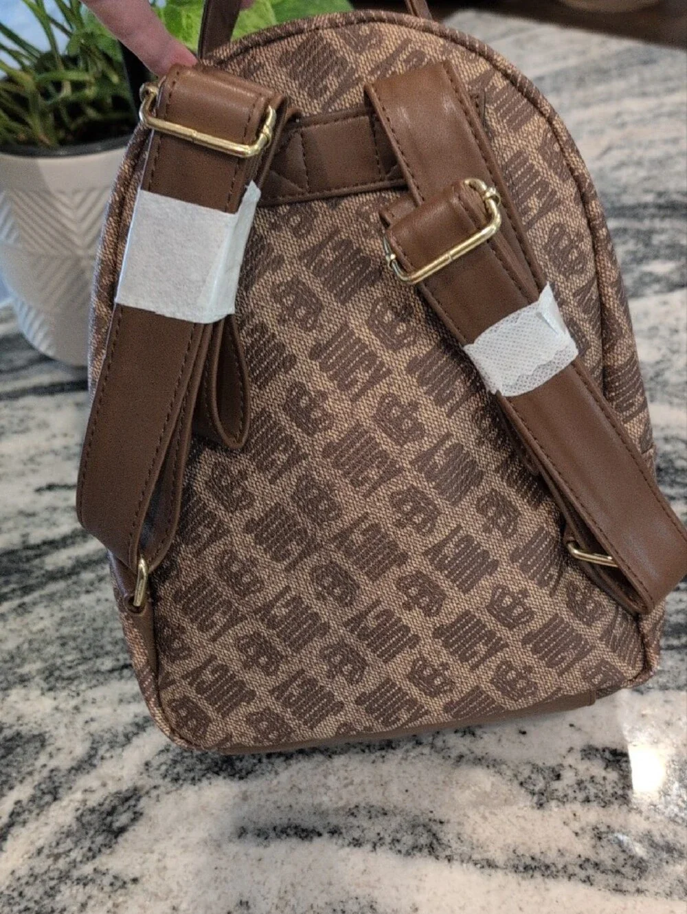 Juicy Couture Brown Monogram Mini Backpack with Gold Accents